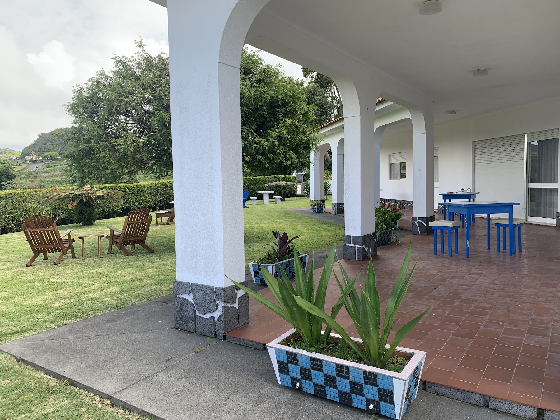 Covered veranda and garden seating at Casa Branca